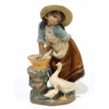 LLADRO; a figure group of a girl, a goose and a gosling, number 2216, height 23.5cm.Condition