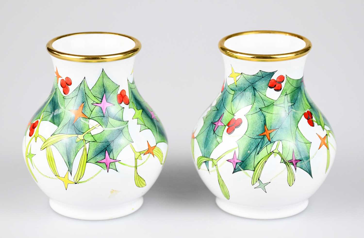 MOORCROFT; a pair of baluster shaped vases decorated in the 'Christmas Lights' pattern, height 6.5cm