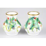 MOORCROFT; a pair of baluster shaped vases decorated in the 'Christmas Lights' pattern, height 6.5cm