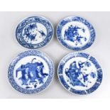 Four late 19th century Chinese blue and white porcelain plates to include a near pair of an elder