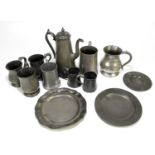 A collection of assorted 19th century and later pewter to include a coffee pot, a mug, plates.