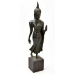 A Thai bronze figure of a buddha, modelled with left hand raised, set into a square sectioned