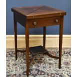 An Edwardian inlaid mahogany envelope card table, with drawer and undertier on tapered legs,