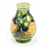 SALLY TUFFIN FOR MOORCROFT; a squat baluster vase decorated in the 'Seasons (summer)' pattern,