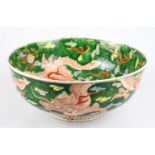 A Chinese Famille Verte footed bowl, decorated with three claw dragon chasing Pearl of Wisdom,