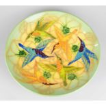 SALLY TUFFIN FOR DENNIS CHINAWORKS; a large footed circular bowl decorated with hummingbirds,