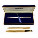 WATERMANS; a cased gold plated fountain pen, with 18K nib, and matching ballpoint, together with a