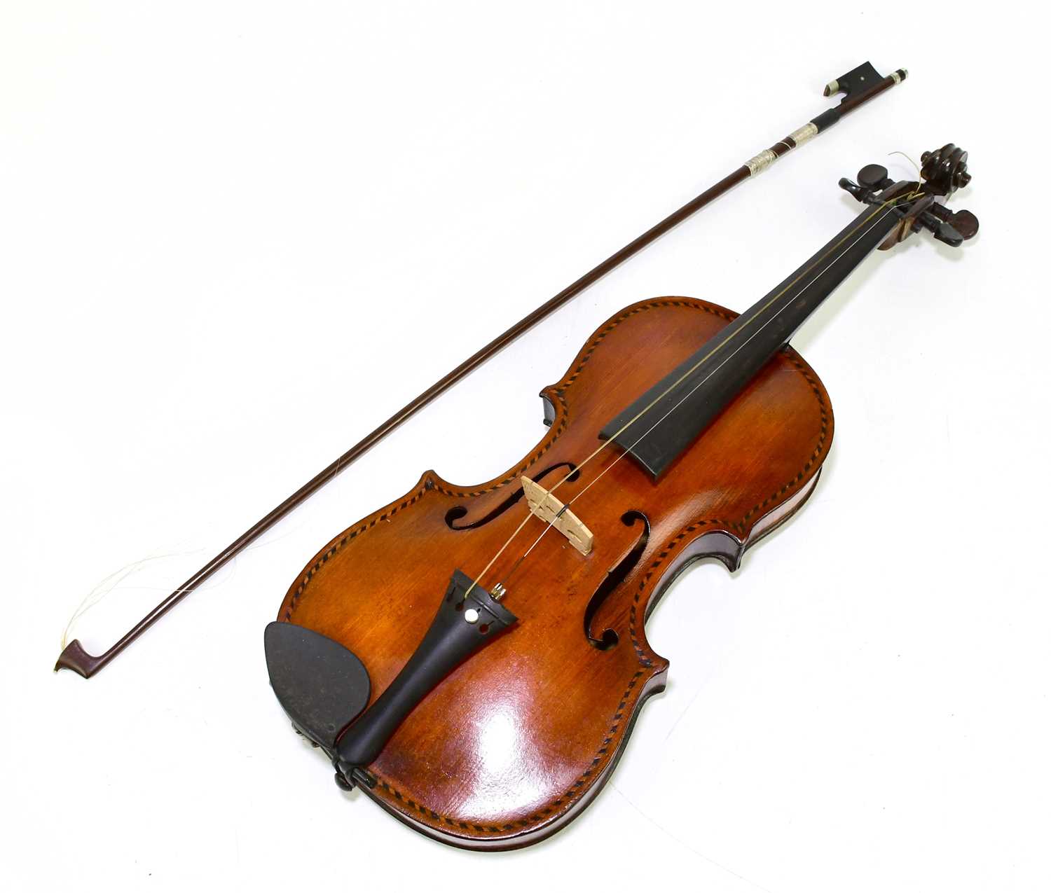 A full size German violin with inlaid decoration and one-piece back, length of back 35cm, cased.