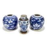 An early 20th century Chinese blue and white crackle glazed ginger jar, decorated with four claw