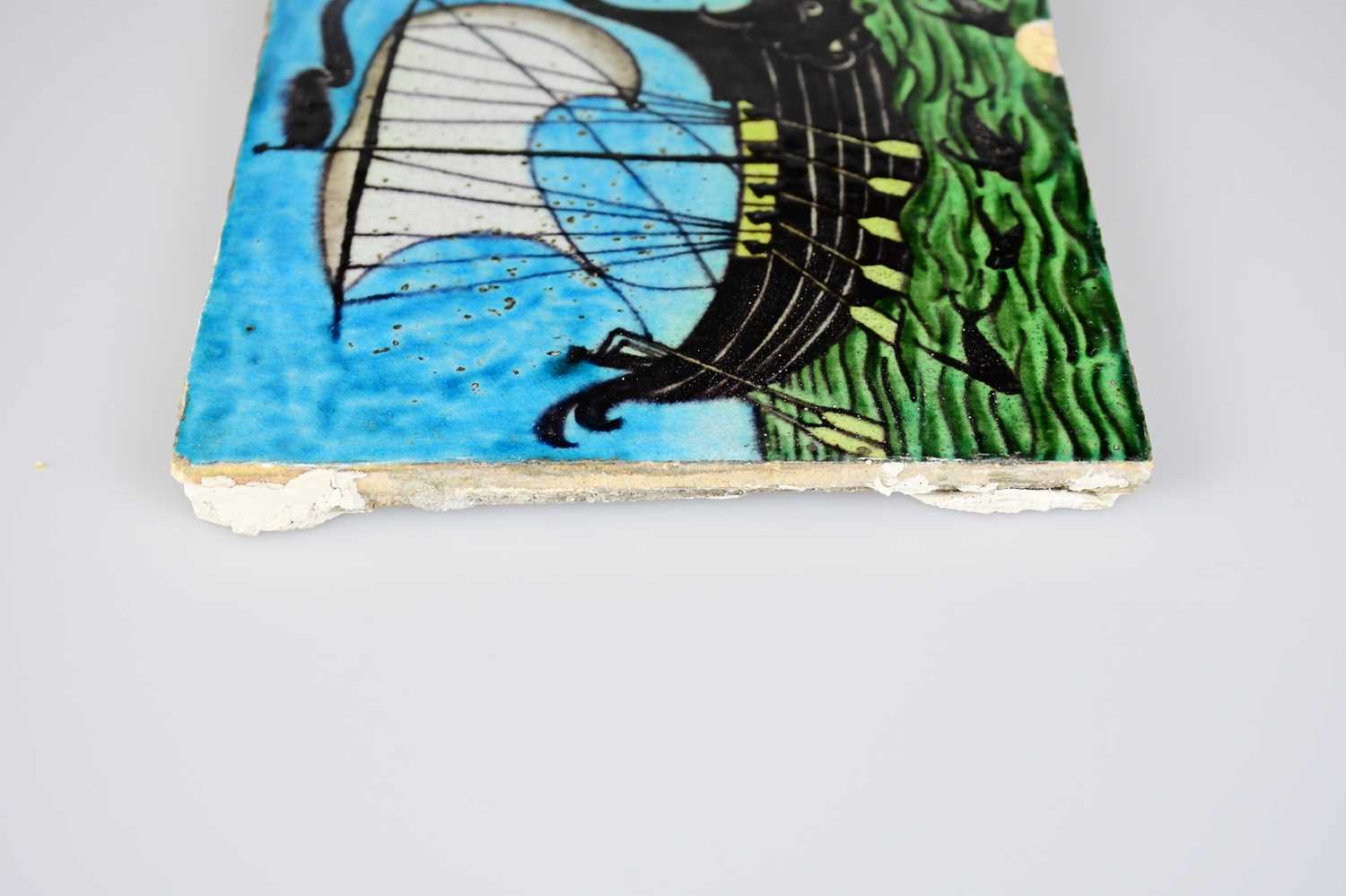 WILLIAM DE MORGAN; an Art Pottery tile painted with a galleon ship with six sailors with paddles - Image 4 of 6