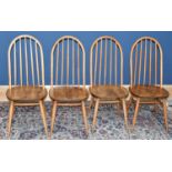 A set of four mid century light elm dining chairs, possibly Ercol (4).