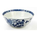 A very large late 19th century Chinese blue and white bowl decorated to interior and exterior with