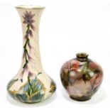 COBRIDGE; a large vase with elongated neck and floral decoration, height 32cm, with a bulbous vase