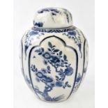 A 19th century Chinese blue and white porcelain ginger jar and cover, painted with objects and