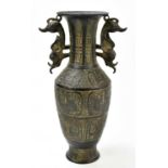 A contemporary archaic style twin handled Chinese metal vase with incised detail, height 43.5cm.