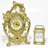 A 19th century cast and pierced brass eight day strut timepiece of 18th century design, height 31cm,