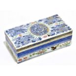 A 19th century Chinese Canton Famille Rose rectangular box and cover, with floral sprays and central