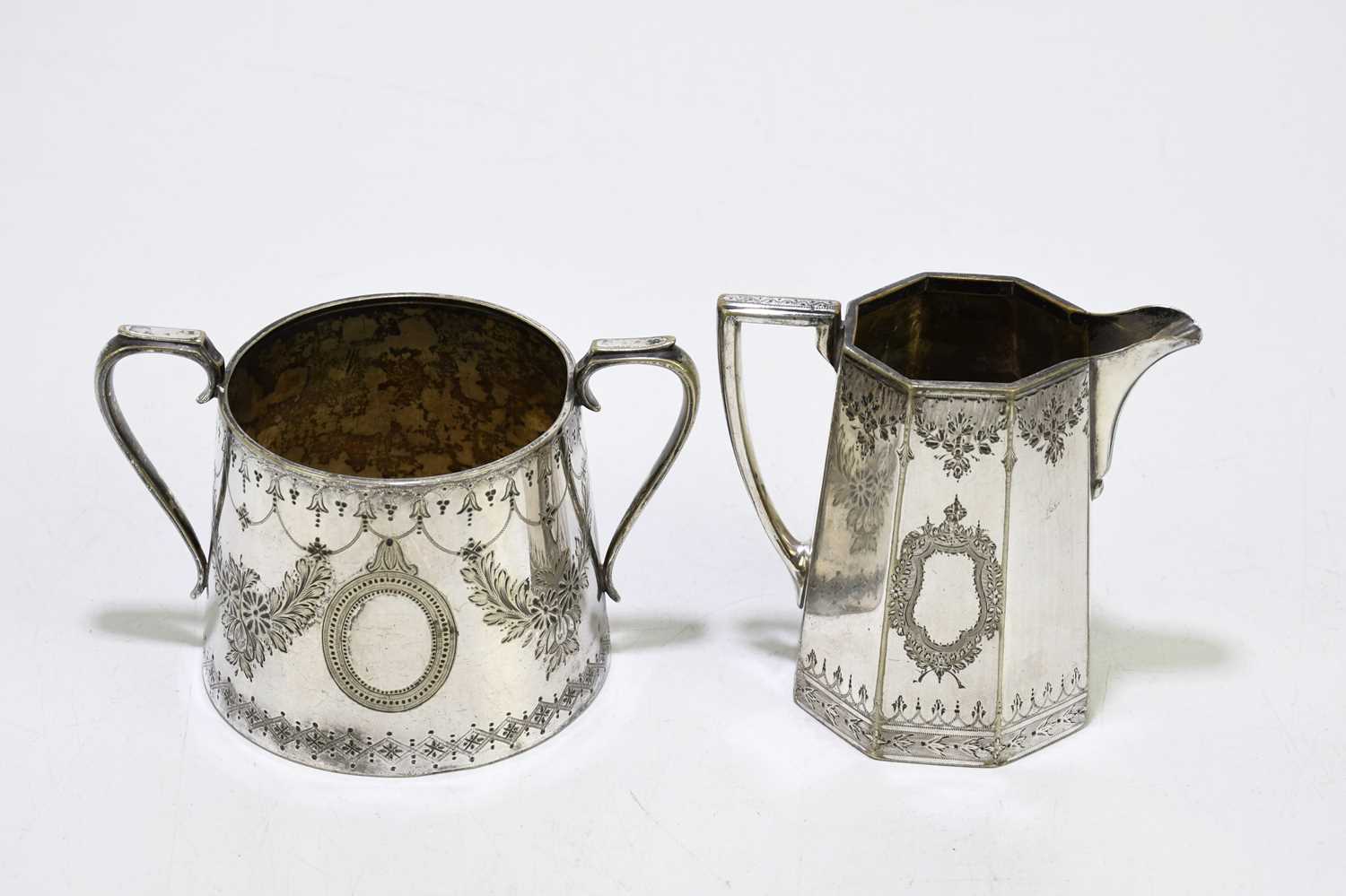 Two silver plated teapots with a sugar bowl, a cream jug and a dish. - Image 5 of 7
