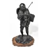 A large Japanese Meiji period bronze figure of a mushroom picker standing with pipe and basket