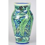 SALLY TUFFIN FOR DENNIS CHINAWORKS; a cylindrical vase with inverted neck decorated with fish and