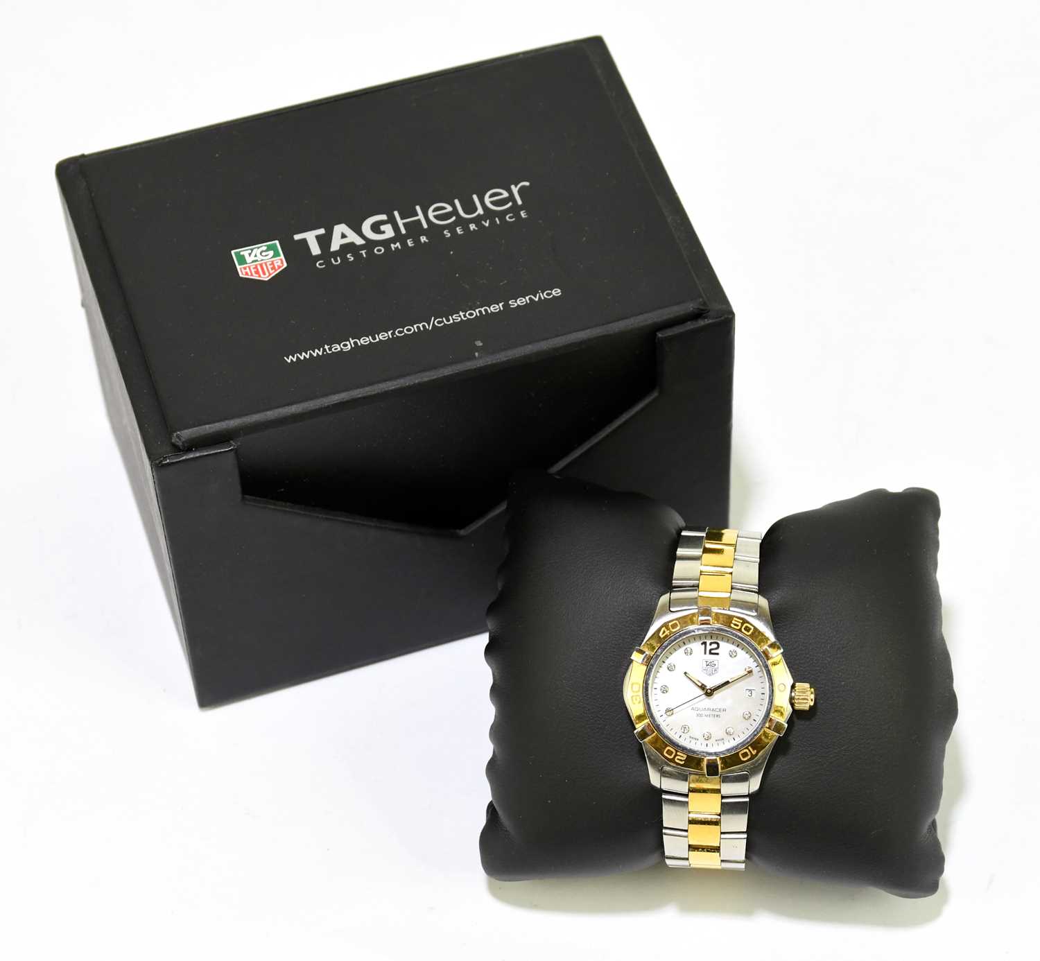 TAG HEUER; a lady's bi-colour stainless steel Aquaracer wristwatch, the mother of pearl dial with