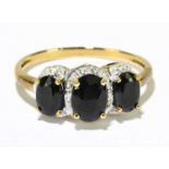 A 9ct yellow gold sapphire and diamond ring, size P, approx. 2.2g.
