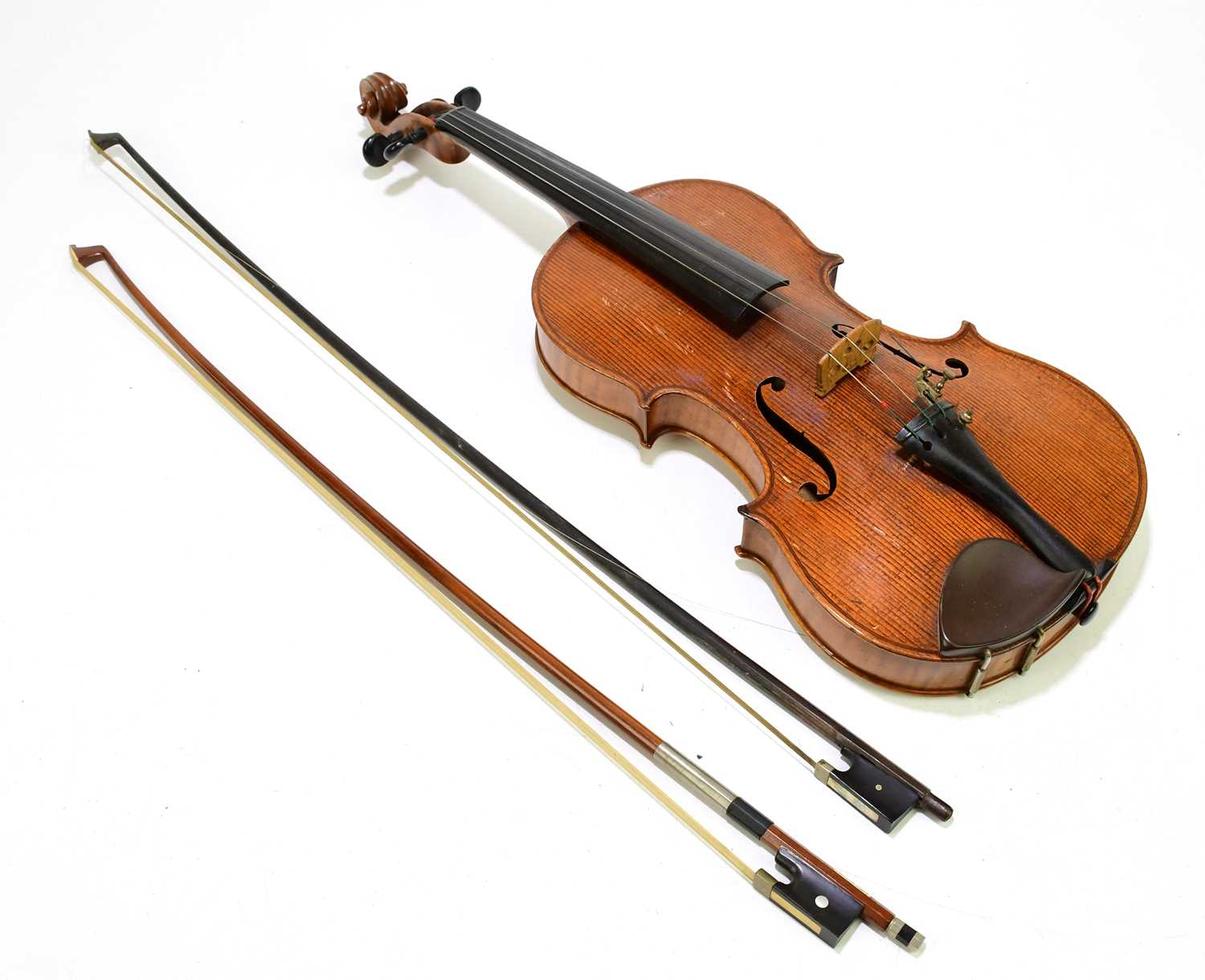 A full size violin, probably French, with interior label 'Carlo Storioni Cremonensis Faciebat 1897',