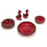 WHITEFRIARS; five pieces of glassware in a ruby red colourway, comprising two Dilly ducks, and three