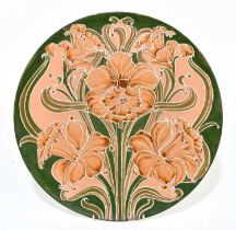 WILLIAM MOORCROFT FOR JAMES MACINTYRE & CO LTD; a Florian Ware wall charger in 'Daffodil' pattern in