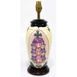 RACHEL BISHOP FOR MOORCROFT; a table lamp decorated in the 'Foxglove' pattern, height including