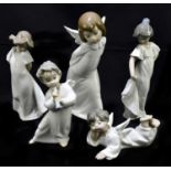 LLADRO; three ceramic figures of angels, height of tallest 24cm, with two Nao figures of girls (5).