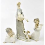 LLADRO; three figures, including two cherubs, one playing a horn, and a maiden holding a goose,