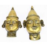 Two Burmese cast brass heads, tallest height 20cm.