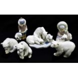 LLADRO; four models of polar bears including a group of three on the ice, model no. 1443, with two