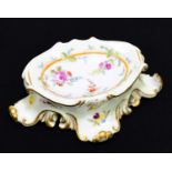 MEISSEN; a 19th century porcelain salt, of 18th century design, hand painted with floral sprigs,