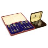 A cased set of six Elizabeth II hallmarked silver menu holders, each with oval plated cartouches,