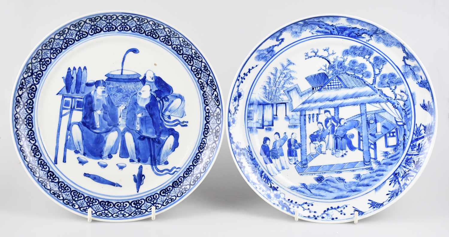 Two 19th century Chinese blue and white plates of circular form to include an example decorated with