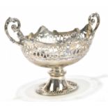 WILLIAM HUTTON & SONS; an Edward VII hallmarked silver twin handled pedestal bowl of oval form, with