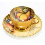THOMAS LOCKYER & RICKETTS FOR ROYAL WORCESTER; a hand painted tea cup and saucer decorated with