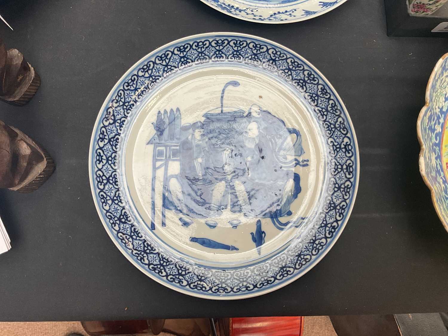 Two 19th century Chinese blue and white plates of circular form to include an example decorated with - Image 3 of 10