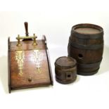 Two coopered oak barrels, height of one 36cm, height of other 16cm, with an Edwardian brass