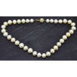 A string of large South Seas pearls, hand tied, and with 15ct sphere clasp set with diamonds, length