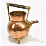 DR CHRISTOPHER DRESSER FOR BENHAM & FROUD; an Arts and Crafts copper and brass kettle with turned