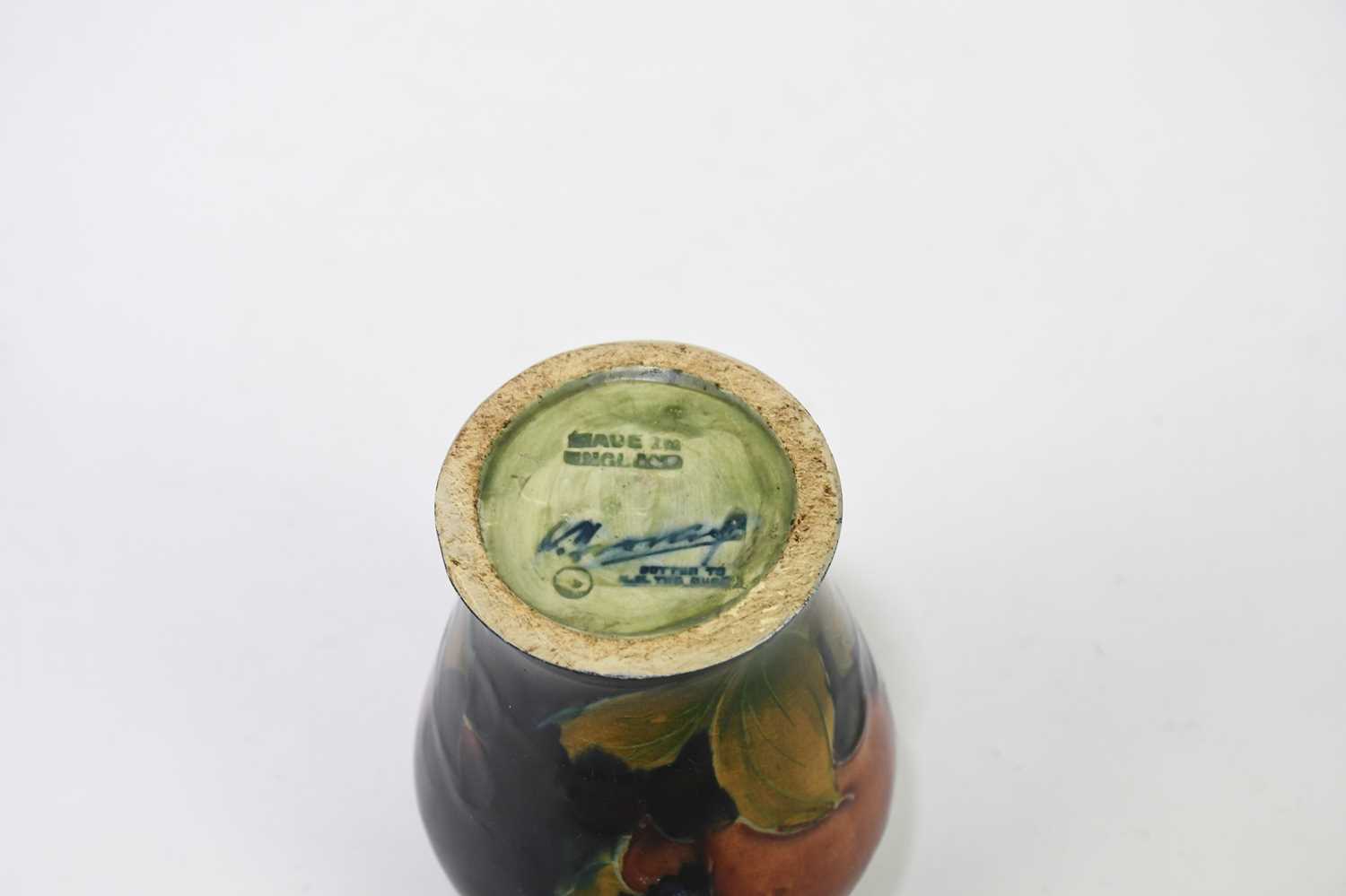 MOORCROFT; a small 'Pomegranate' pattern vase, impressed marks and impressed signature, height 8. - Image 4 of 4