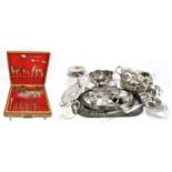 A large quantity of assorted silver plate, to include gallery trays, a teapot, dishes, also a teak