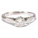 An 18ct white gold illusion set diamond solitaire ring, the diamond weighing approx 0.20ct, size M