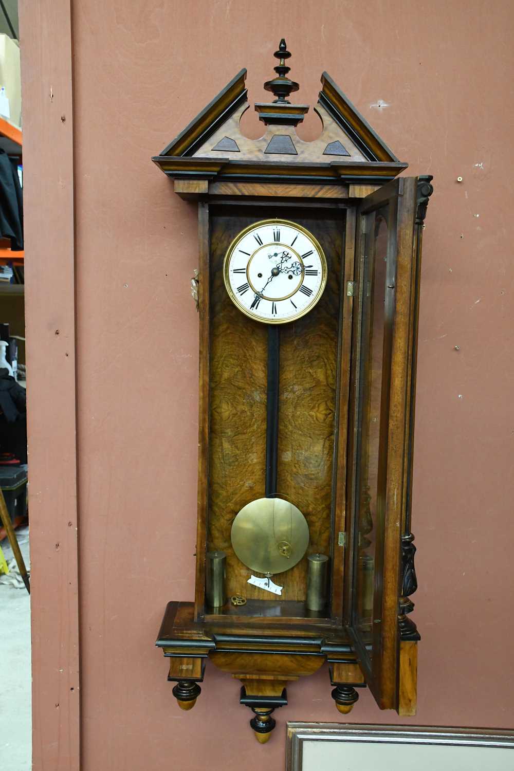 A 19th century walnut and stained pine Vienna wall clock with turned pediment above the circular - Image 2 of 6