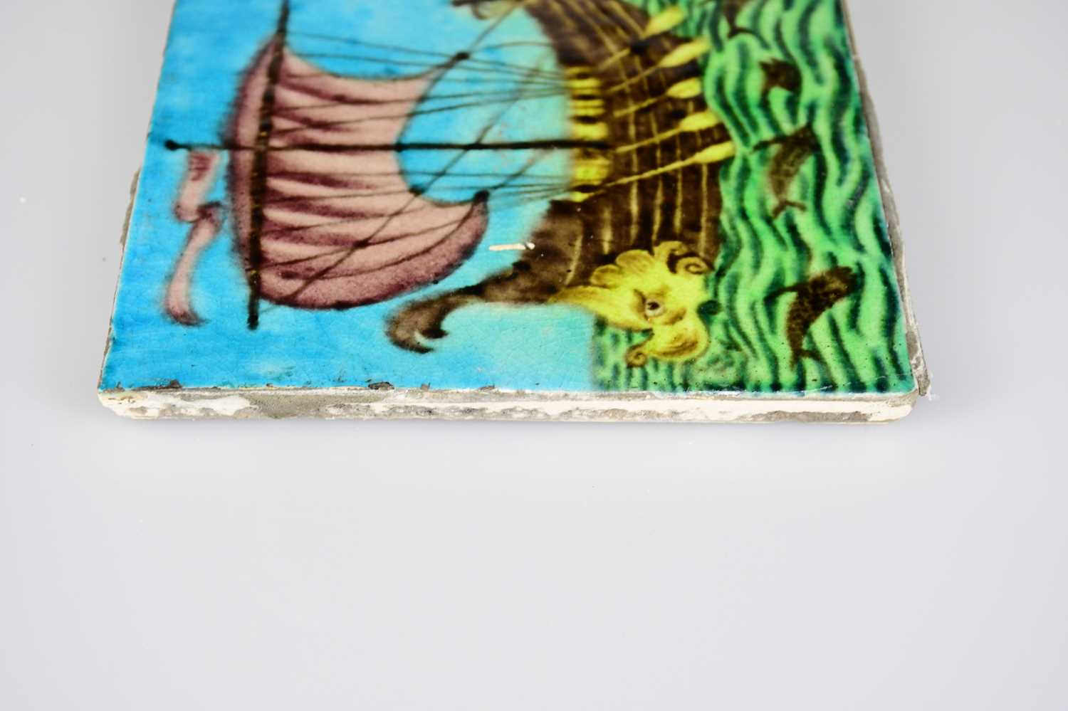 WILLIAM DE MORGAN; an Art Pottery tile painted with a galleon with five sailors, each with paddles - Image 4 of 6