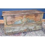 A large 19th century Continental carved hardwood trunk, the front with carved and painted detailing,