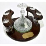 LIVERPOOL FOOTBALL CLUB; a wooden and brass mounted cut glass ship's decanter with four brandy